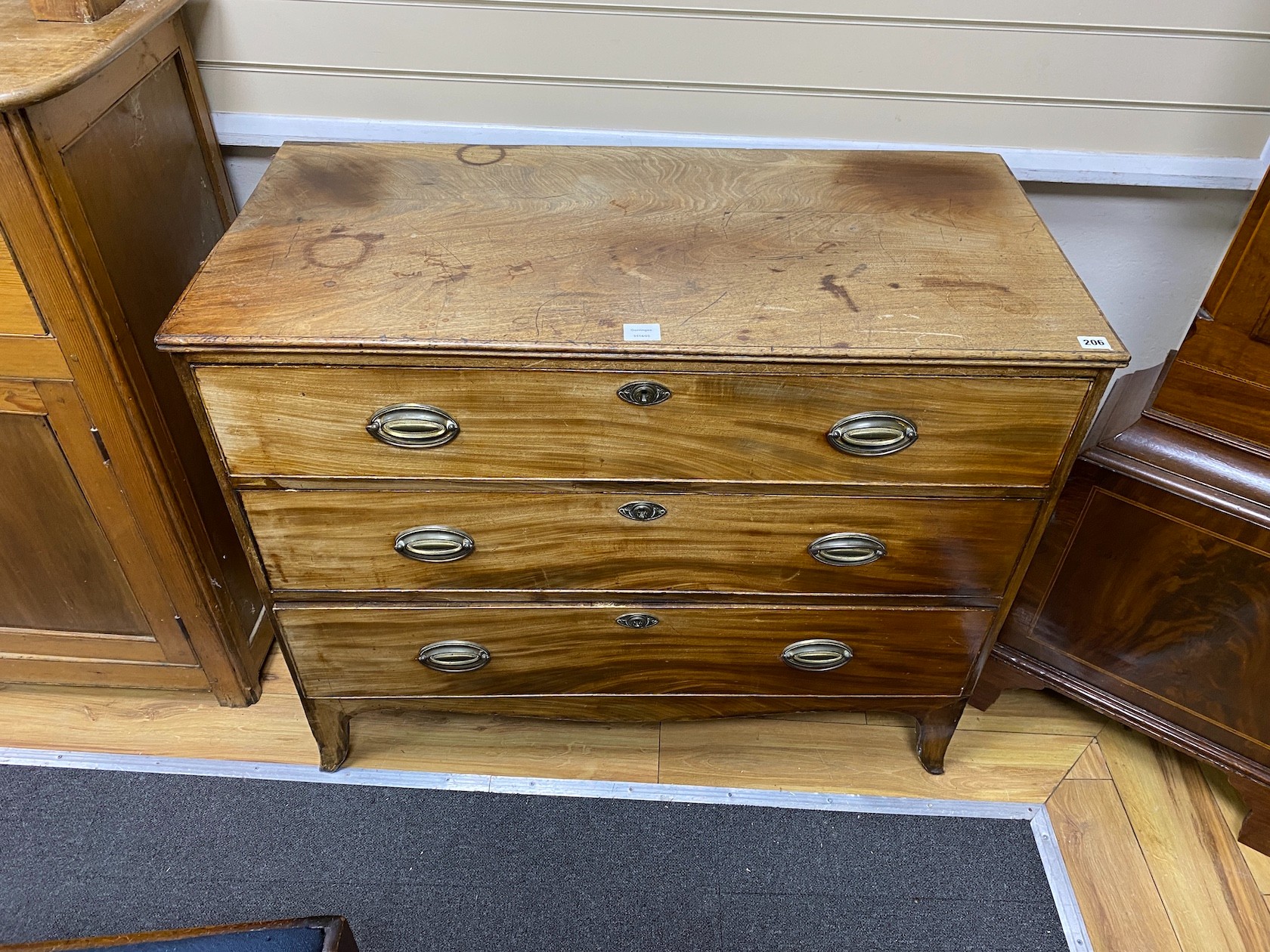 A Regency faded mahogany three drawer chest, width 105cm, depth 50cm, height 88cm